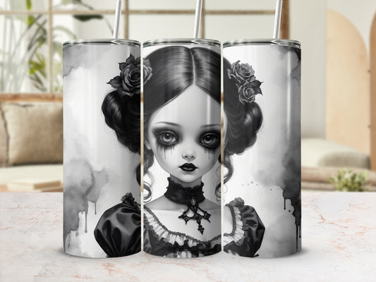 Gothic doll with dark eye makeup and ornate collar on a tumbler.