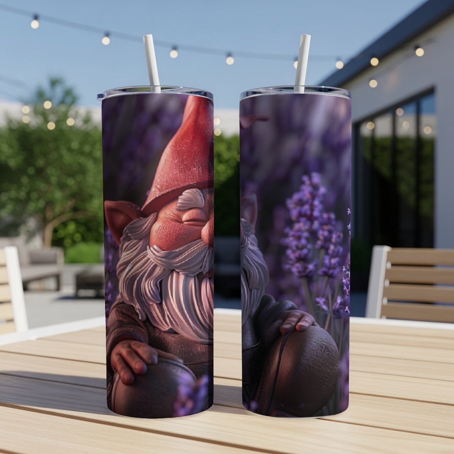 Two tumblers with a gnome illustration sit on a table with lavender.