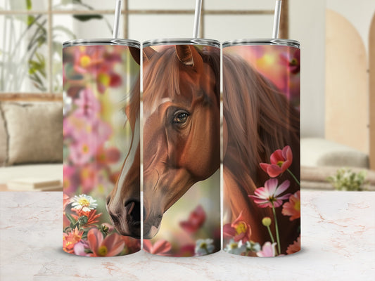 Horse's head and flowers on a cylindrical tumbler.