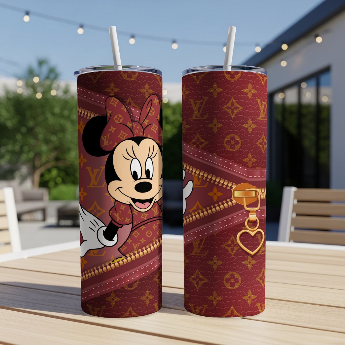 Minnie Mouse on a brown patterned tumbler with zipper and heart detail.