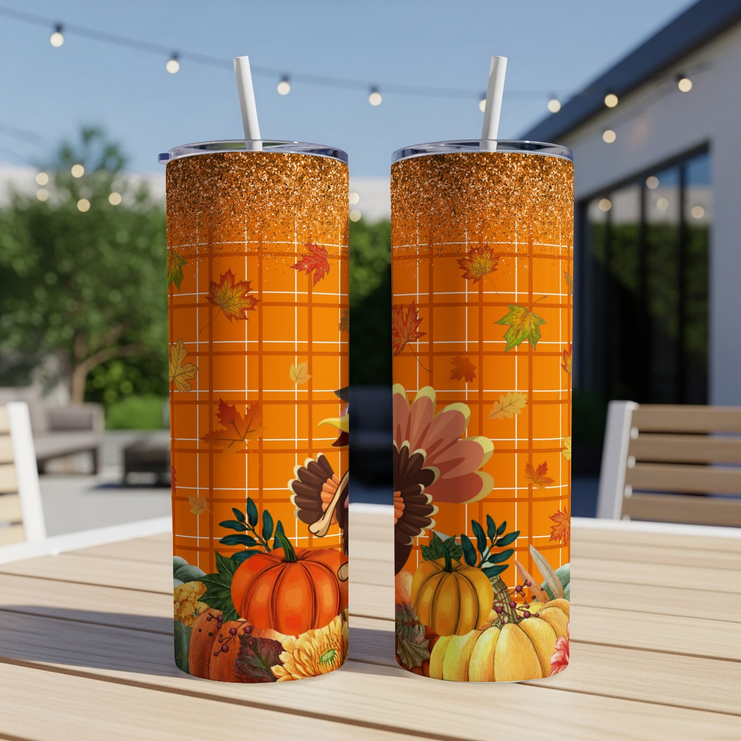 Two tumblers with Thanksgiving-themed design, pumpkins, leaves, and plaid pattern.