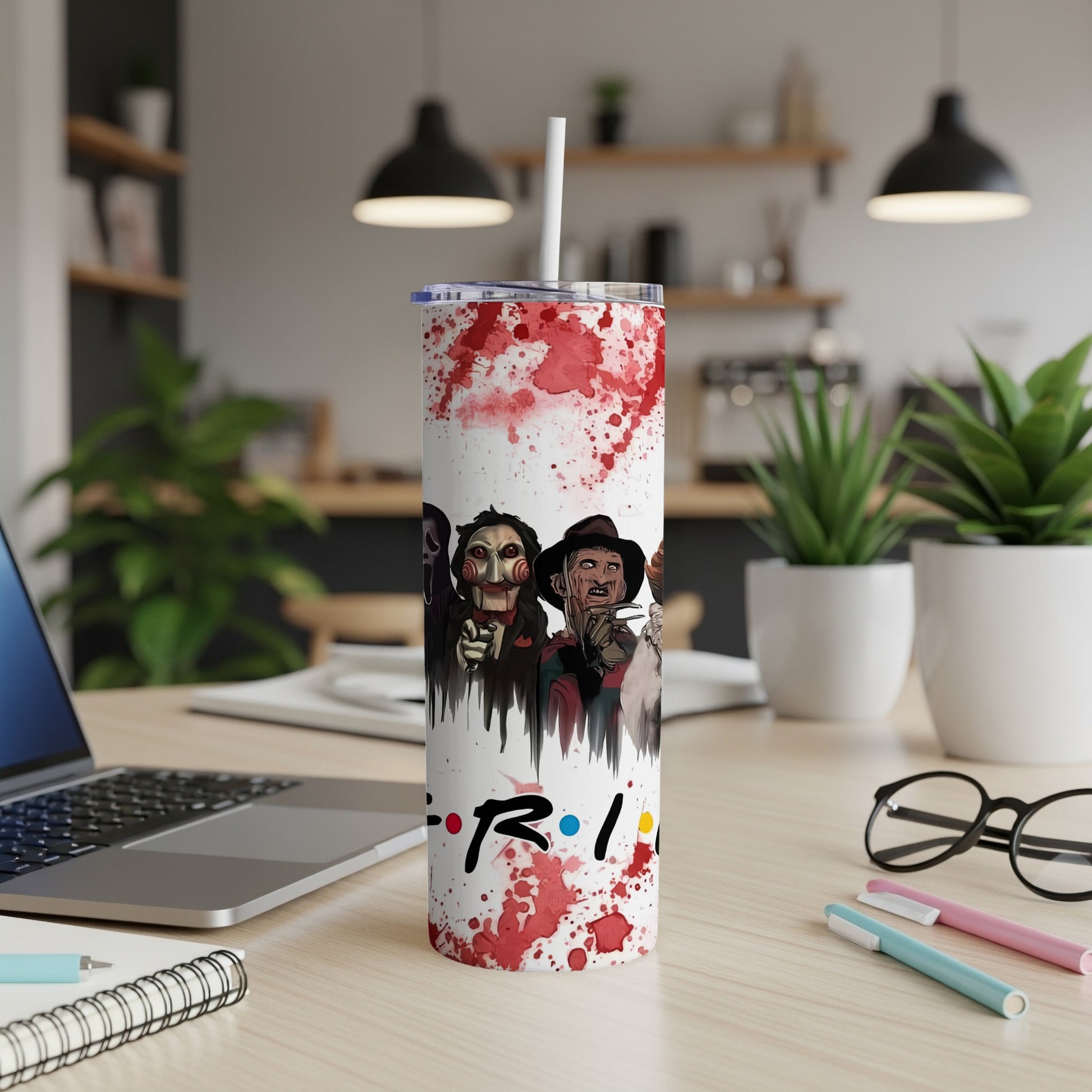Tumbler with horror movie characters and "Friends" logo, splattered with red.