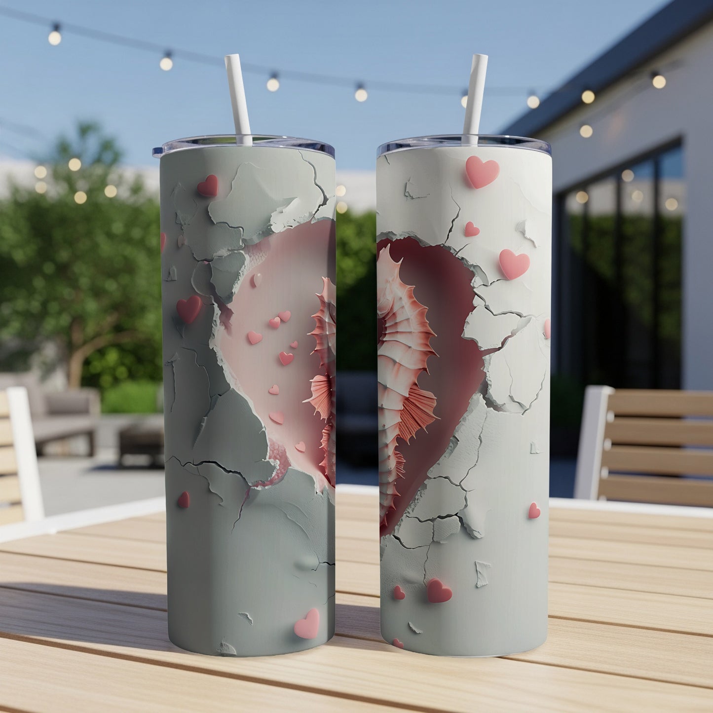 Two tumblers with cracked heart design and pink heart accents.