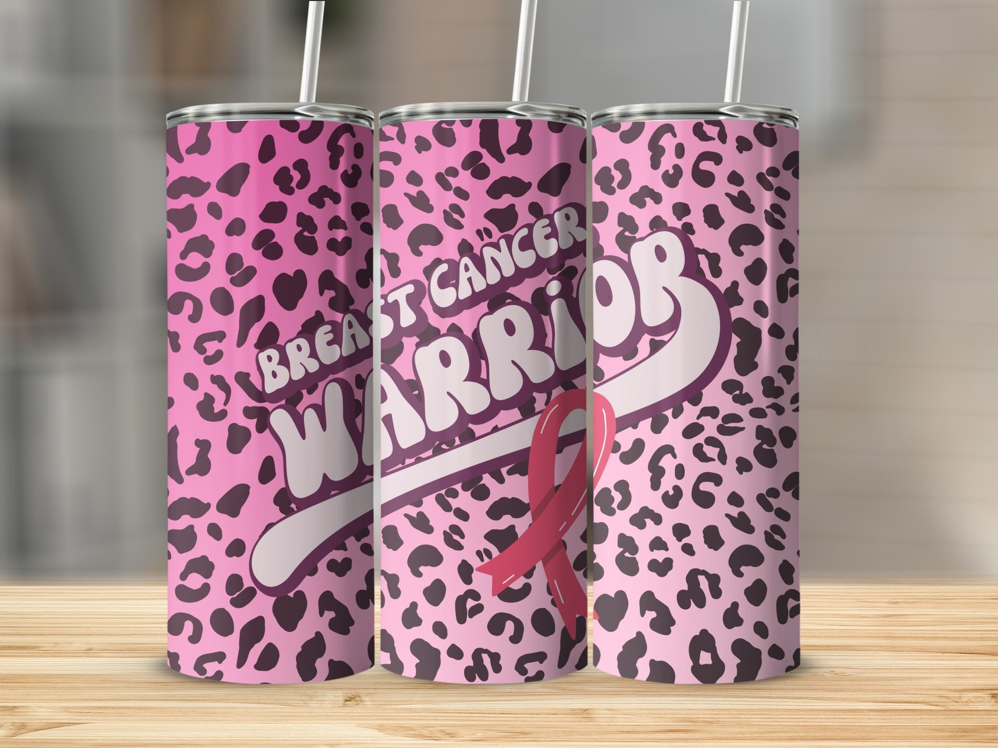 Pink leopard print tumbler with "Breast Cancer Warrior" text and ribbon.
