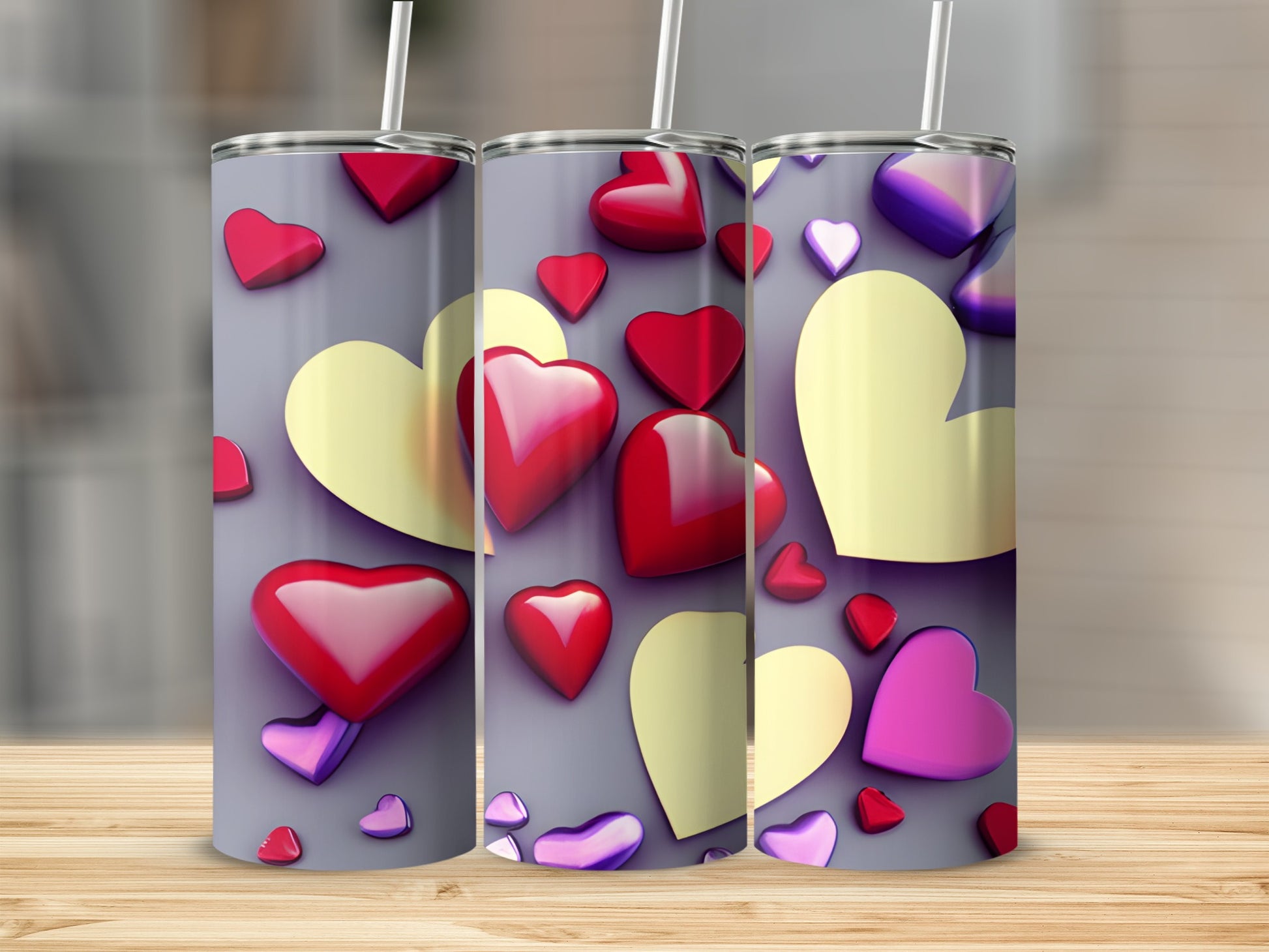 Three tumblers with a Valentine's Day heart pattern.
