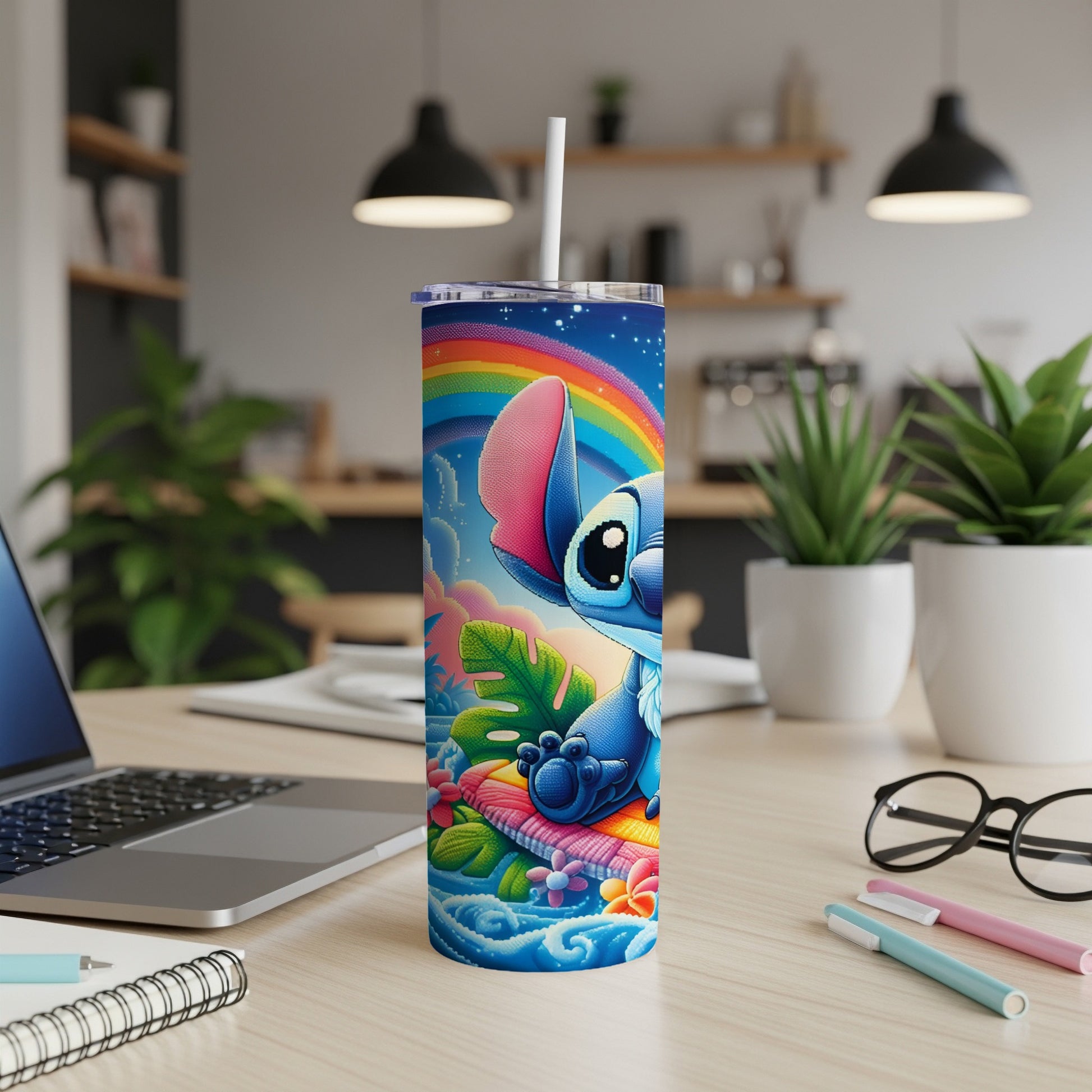 Stitch character on a rainbow and ocean-themed tumbler with a straw.