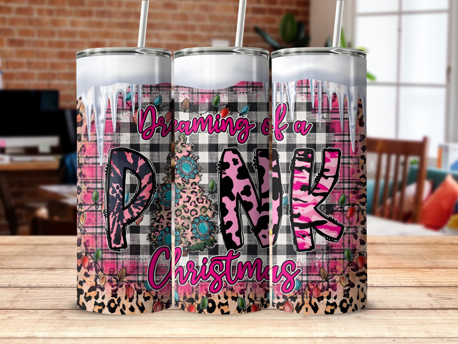 Pink buffalo plaid Christmas tumbler with leopard print and fairy lights.