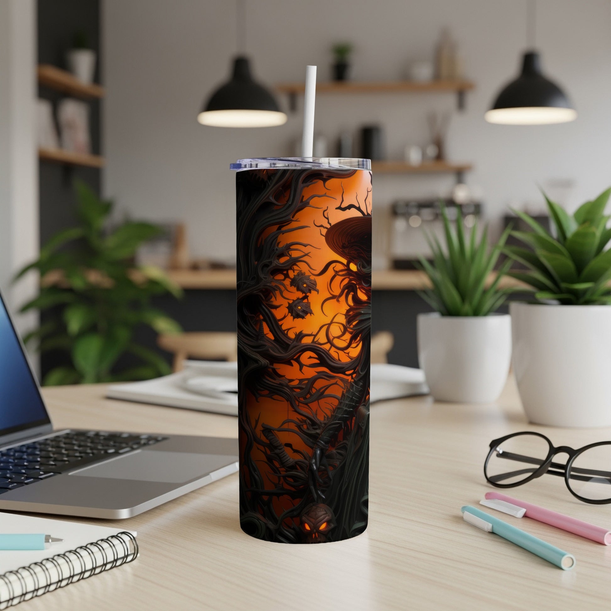 Tall tumbler with a Halloween-themed design featuring gnarled trees and glowing eyes.