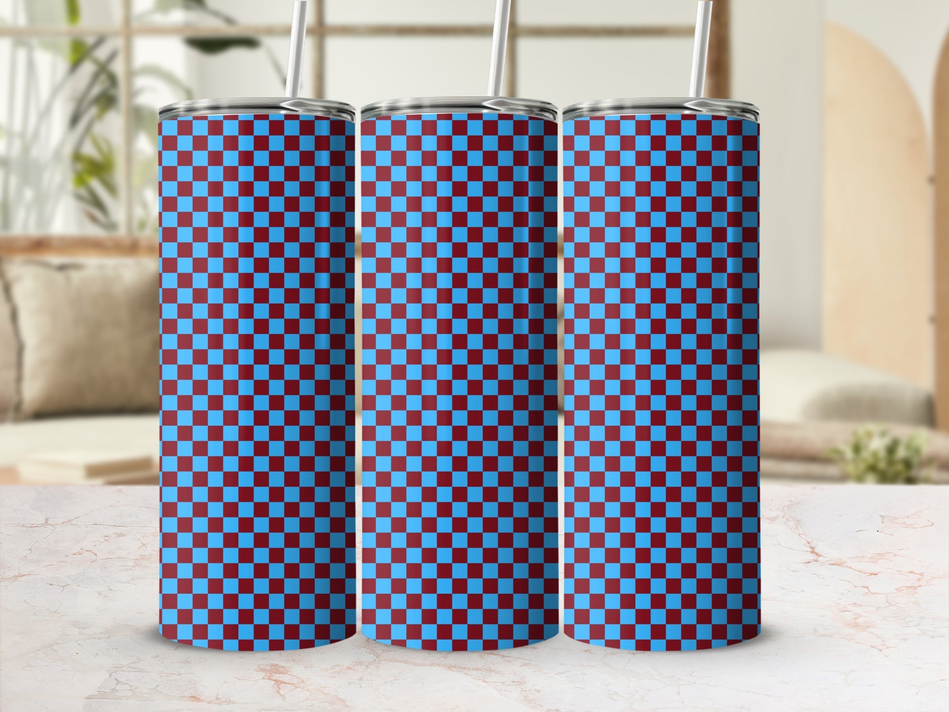 Three tall, skinny tumblers with a maroon and blue checkered pattern.