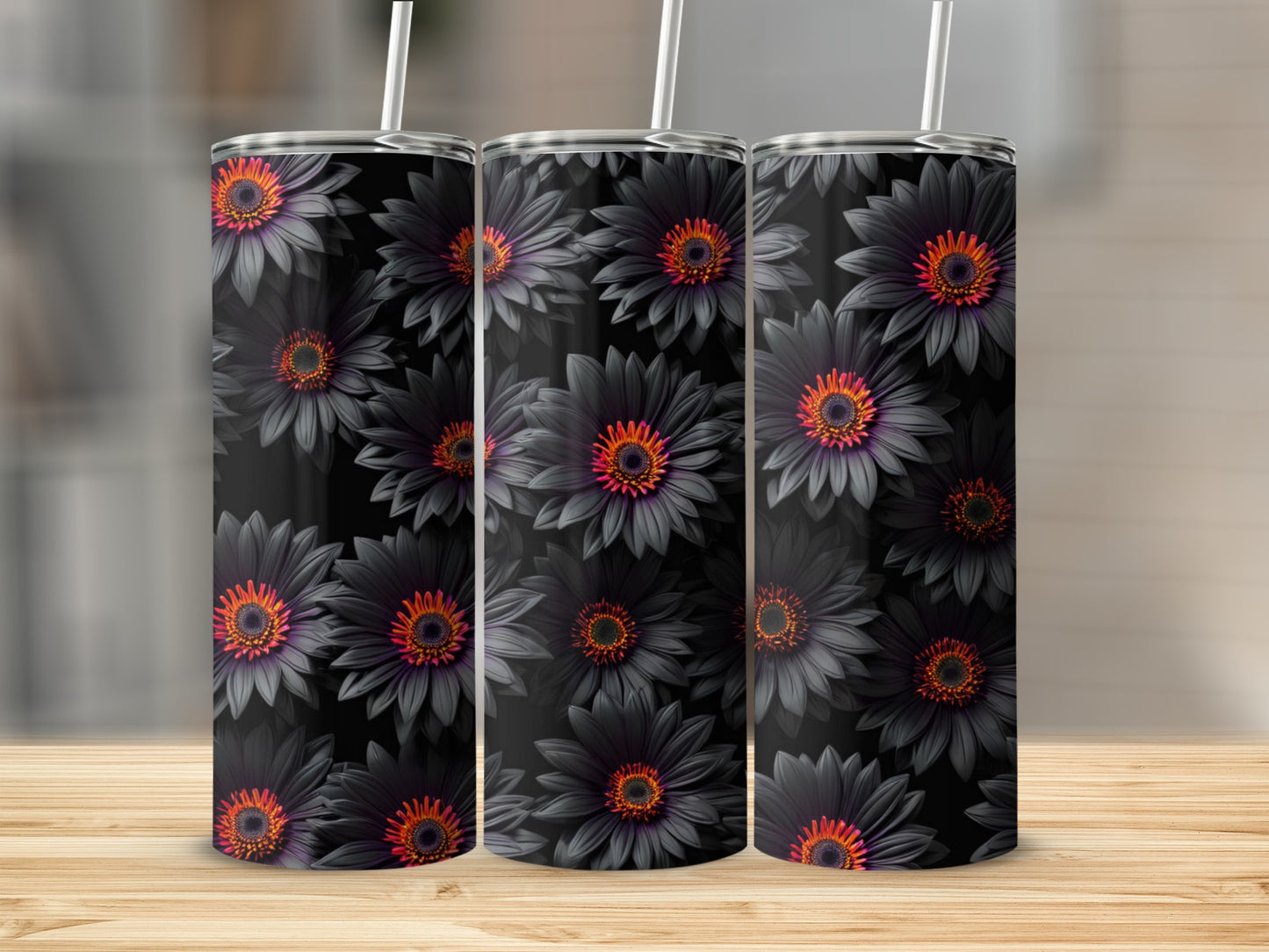 Three tumblers with dark floral pattern featuring orange and red centers.