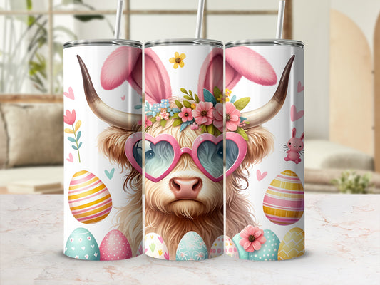 Highland cow with bunny ears and heart sunglasses, surrounded by Easter eggs.