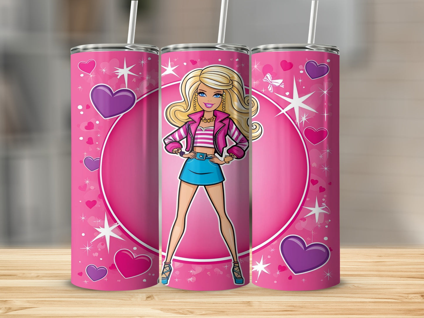 Barbie doll on a pink heart pattern tumbler with straw.