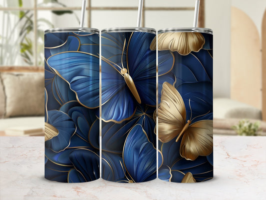 Three tumblers with navy blue and gold butterfly and leaf design.