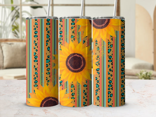 Three tumblers with sunflowers and striped patterns.