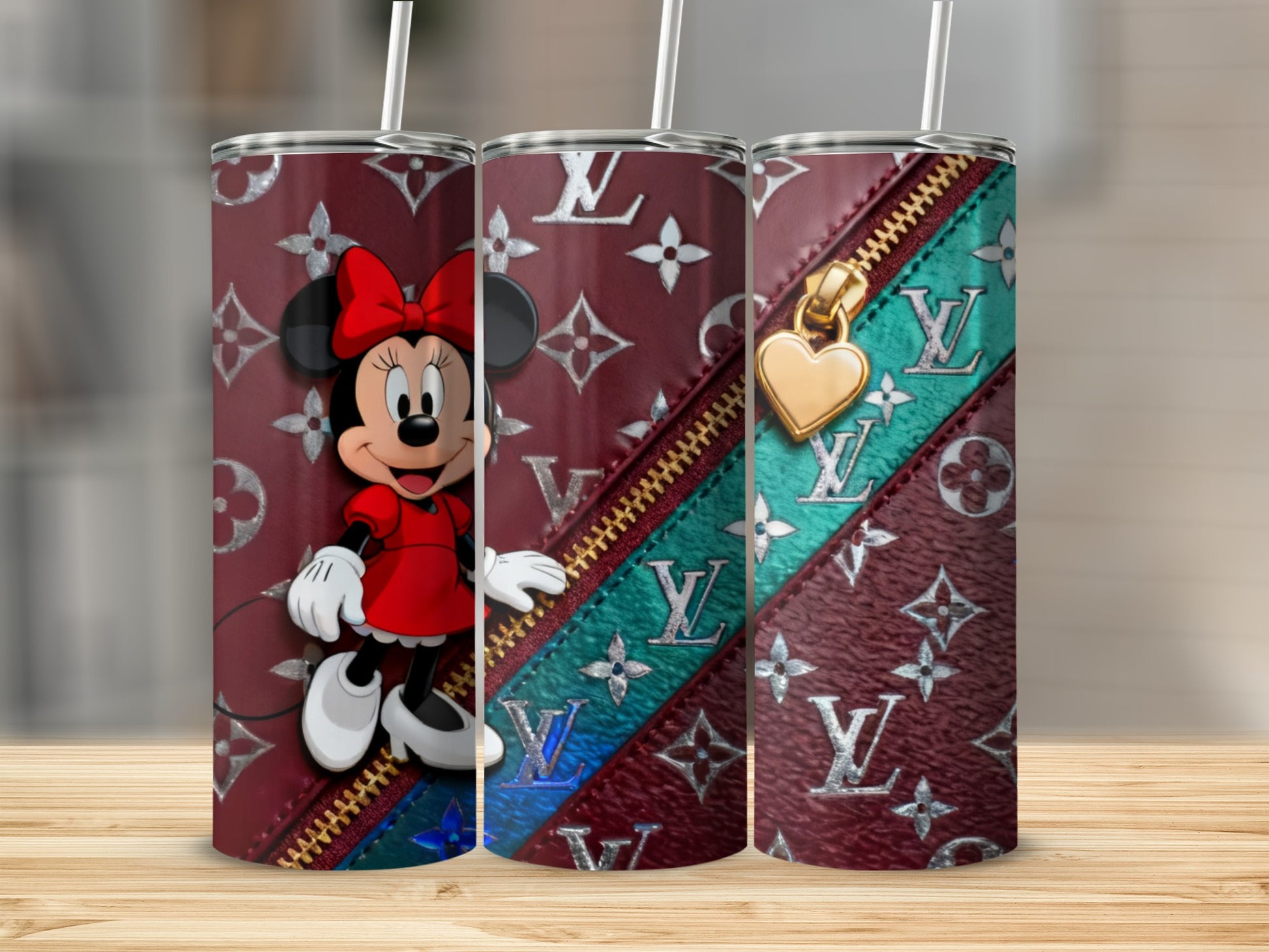 Minnie Mouse on a designer print tumbler with gold zipper accent.