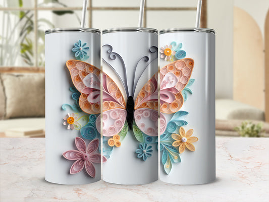 Three tumblers featuring a colorful butterfly and paper flower designs.