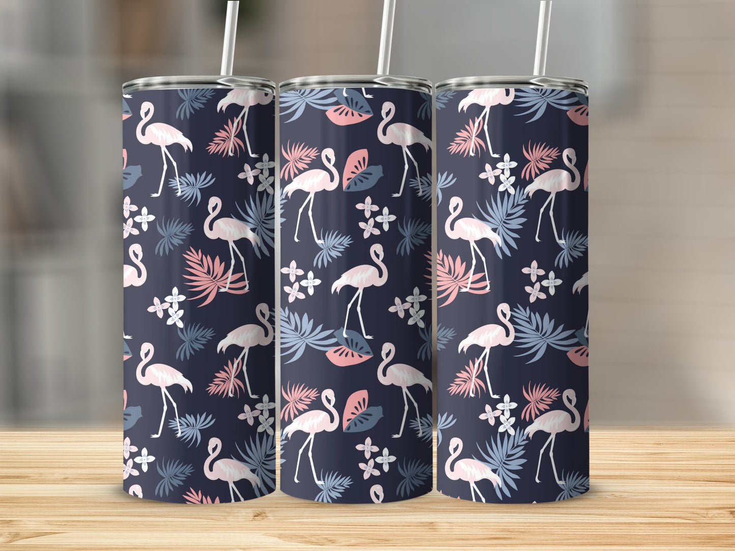 Three tumblers with a navy blue background featuring flamingos and tropical leaves.