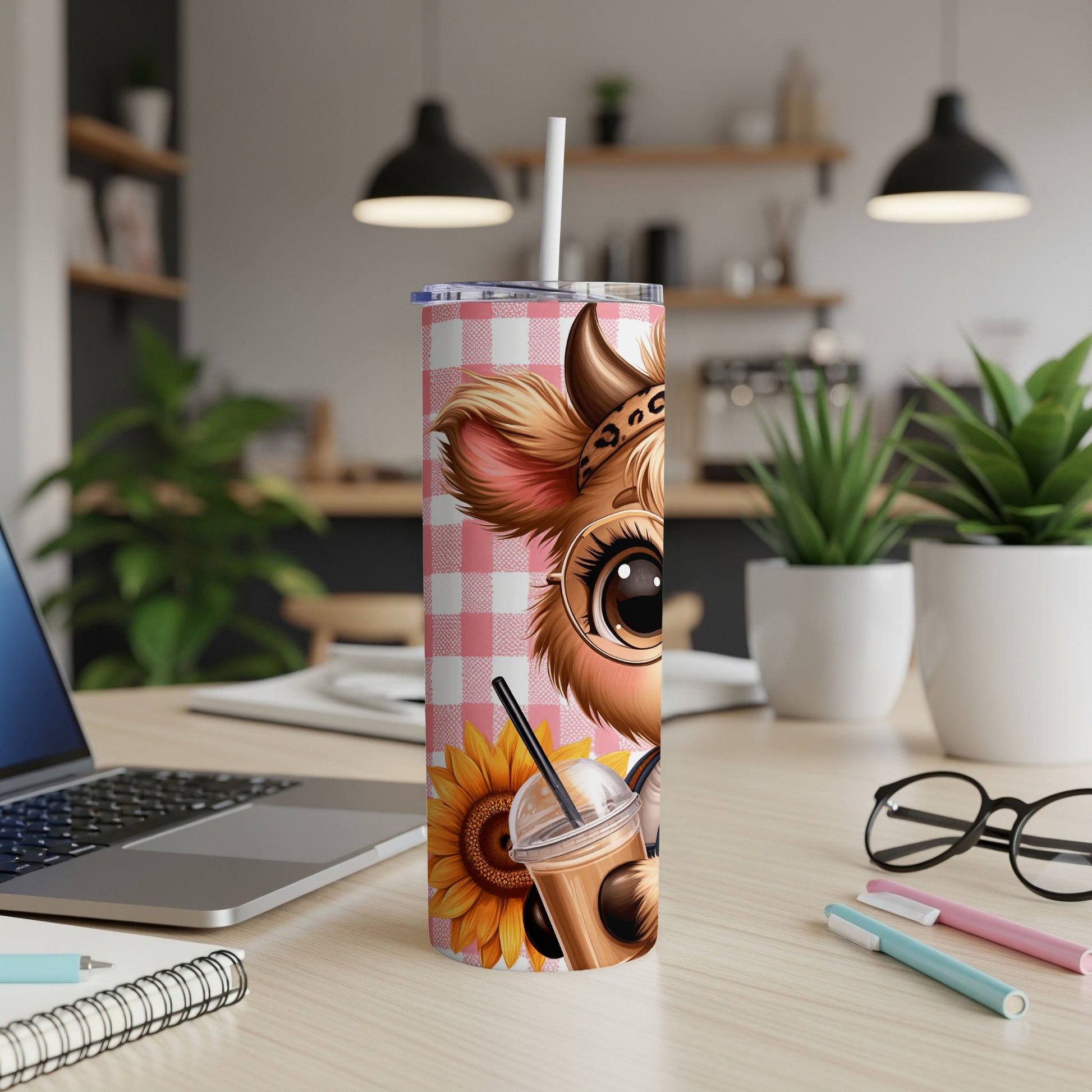 Cartoon cow with sunflower and coffee cup on pink gingham tumbler.