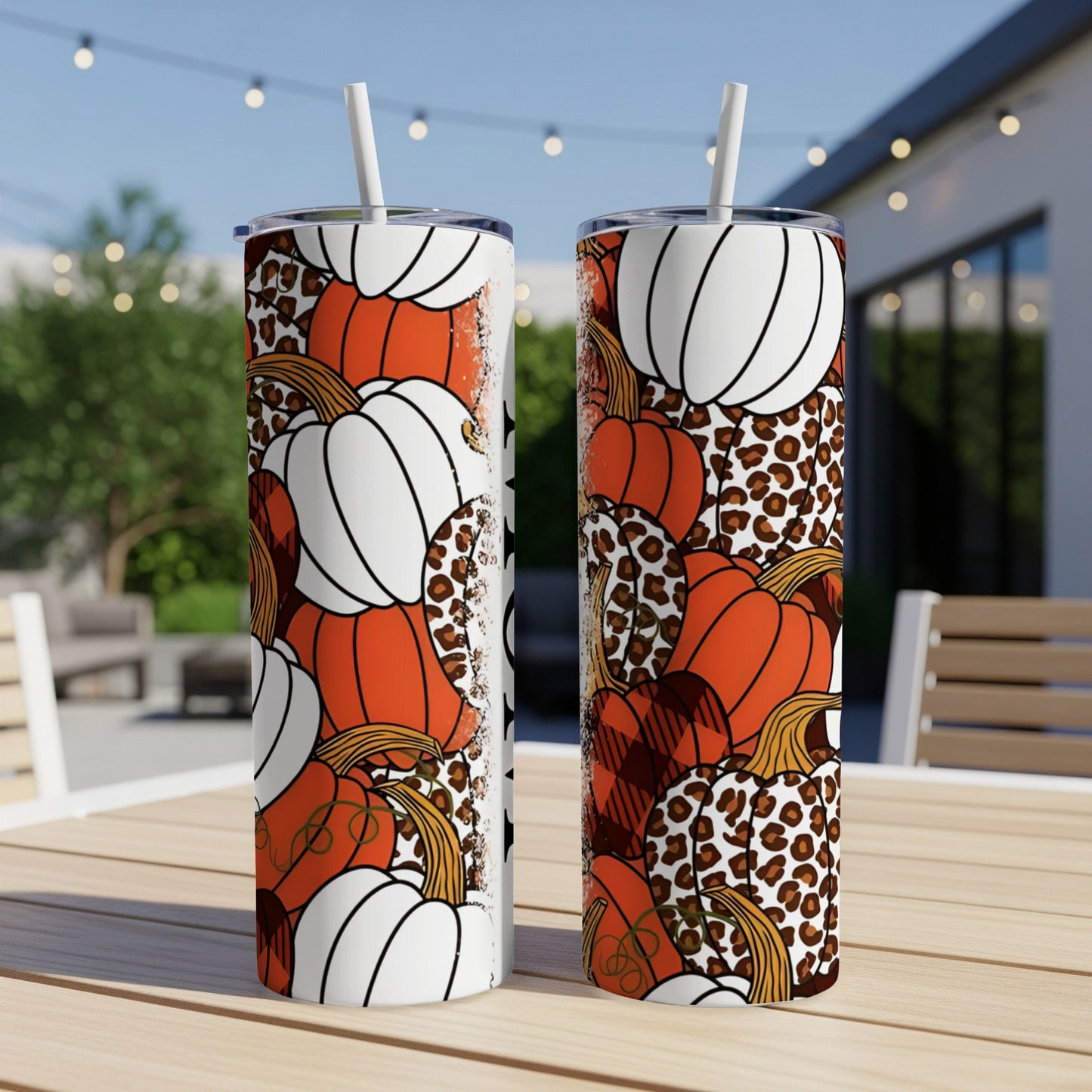 Two tumblers with pumpkin, plaid, and leopard print designs.