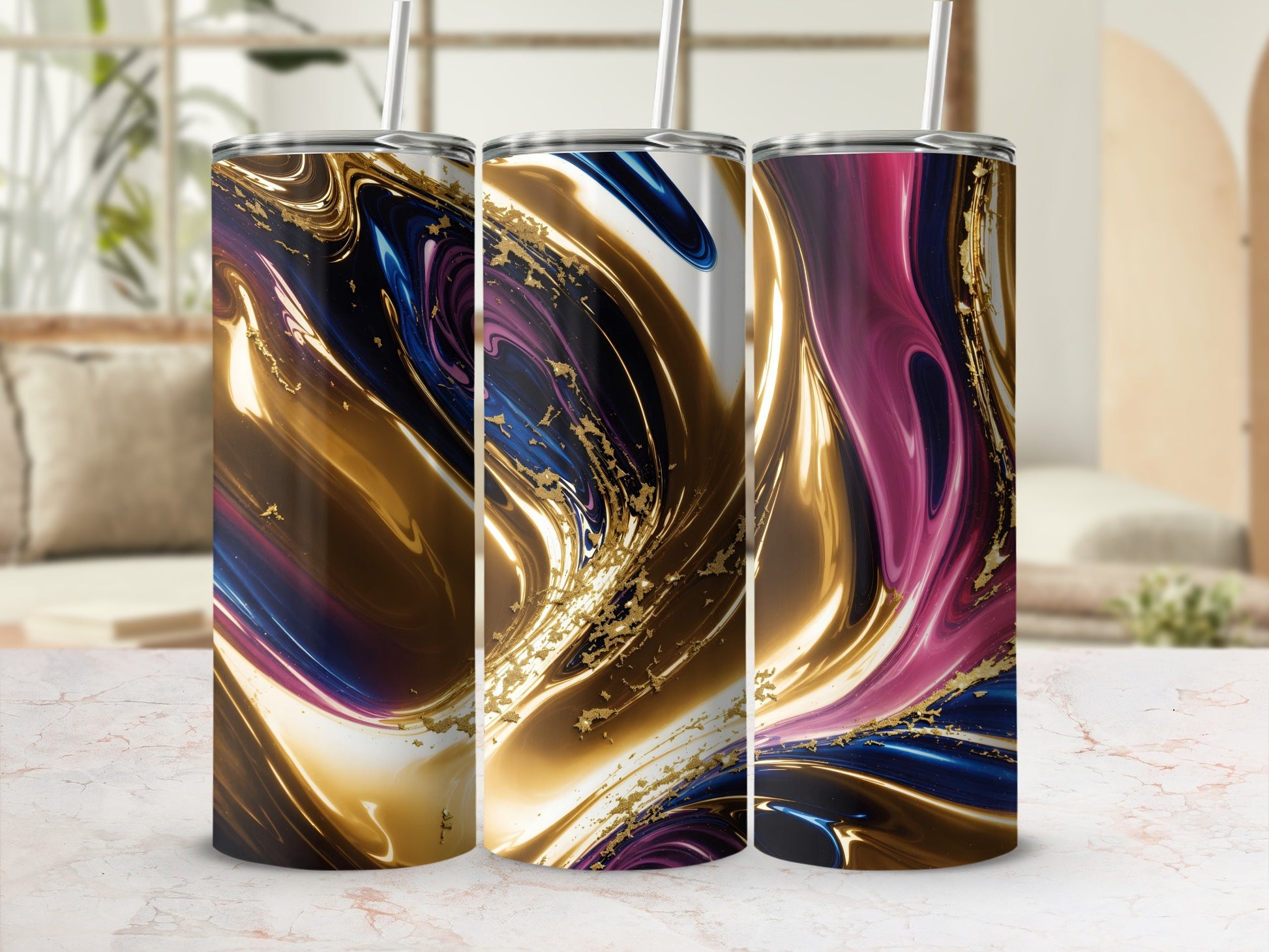 Three tumblers with swirling abstract gold, blue, and pink marbled patterns.