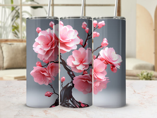 Three cylindrical tumblers with a pink cherry blossom design on a gray background.