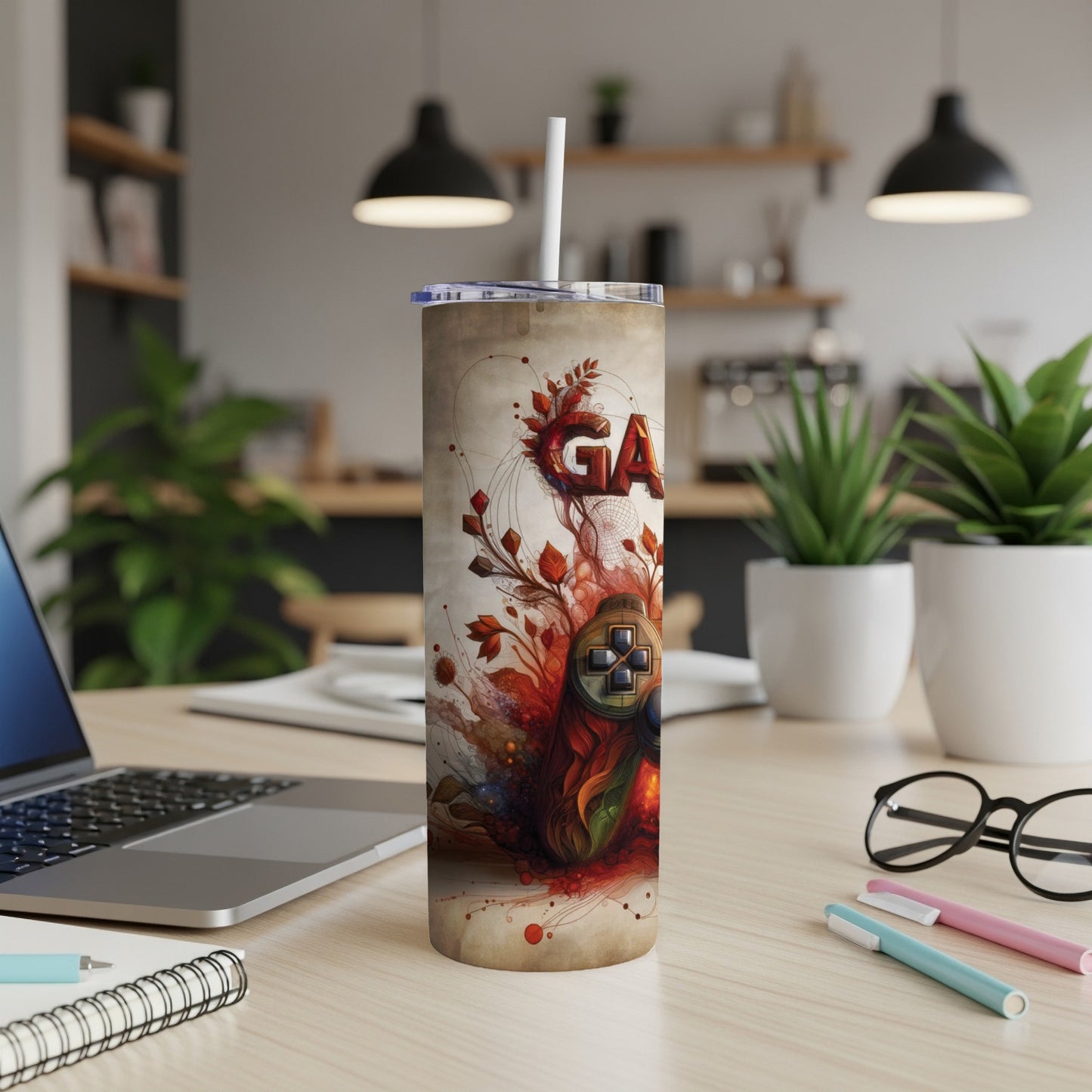 Tall tumbler with gaming controller and floral accents.