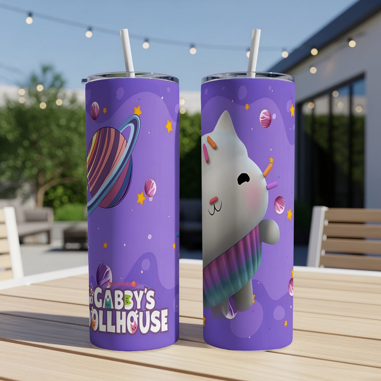 Gabby's Dollhouse tumbler with Pandy Paws and planets on a purple background.