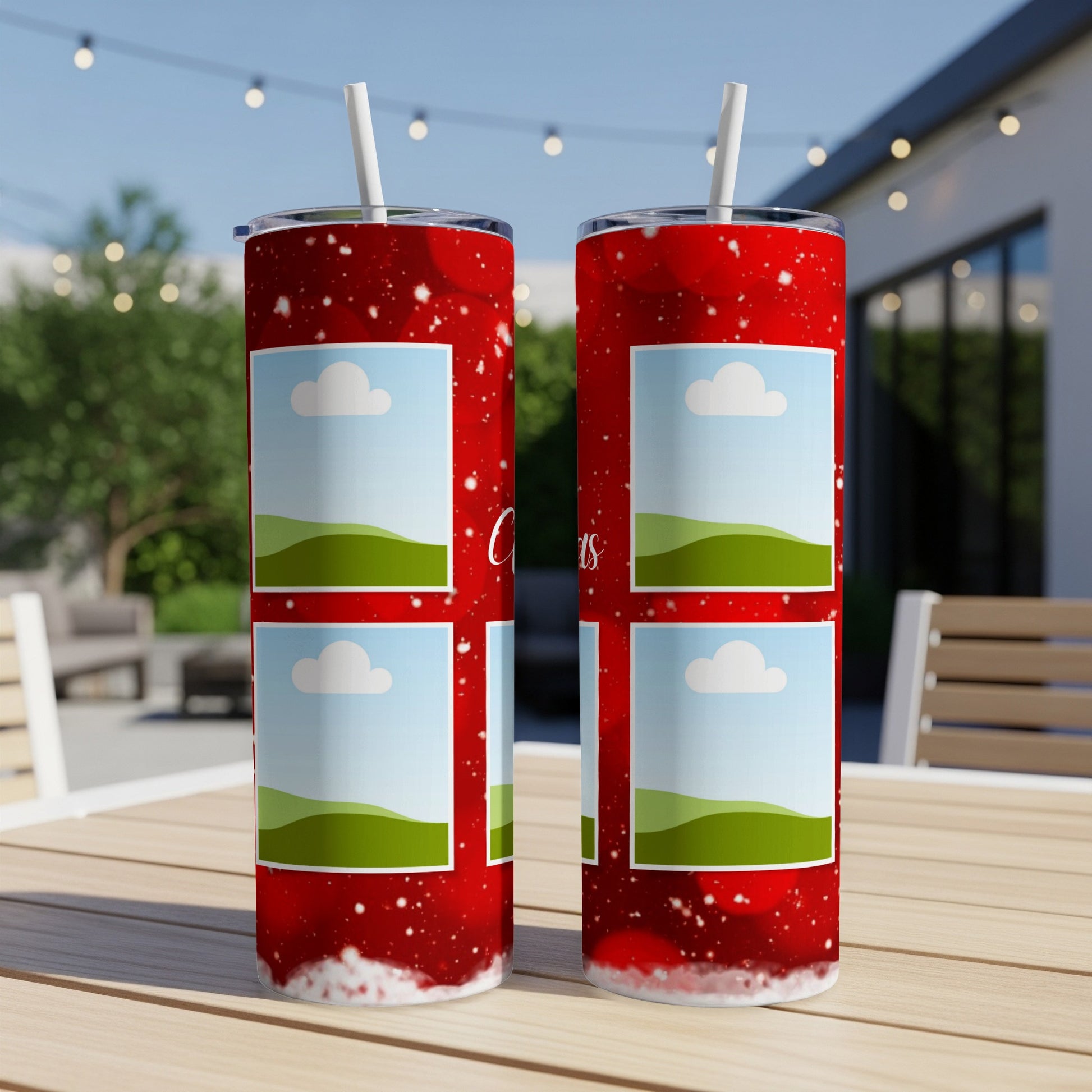 Two red tumblers with white snow dots and photo frames on a table.