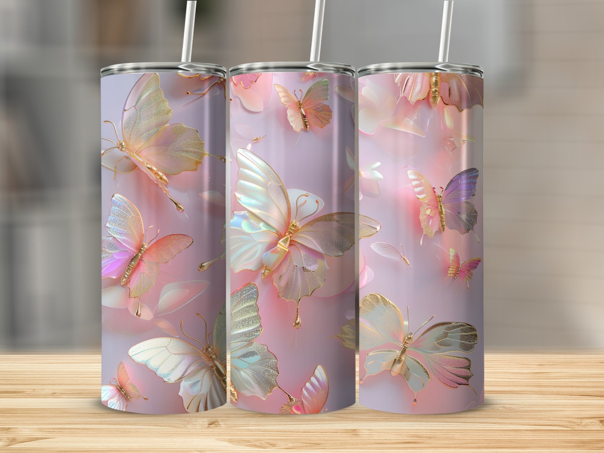 Three translucent tumblers with shimmering iridescent butterflies and floral accents.