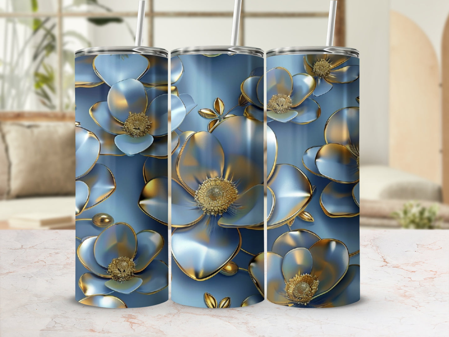 Three tall tumblers with metallic blue floral design and gold accents.