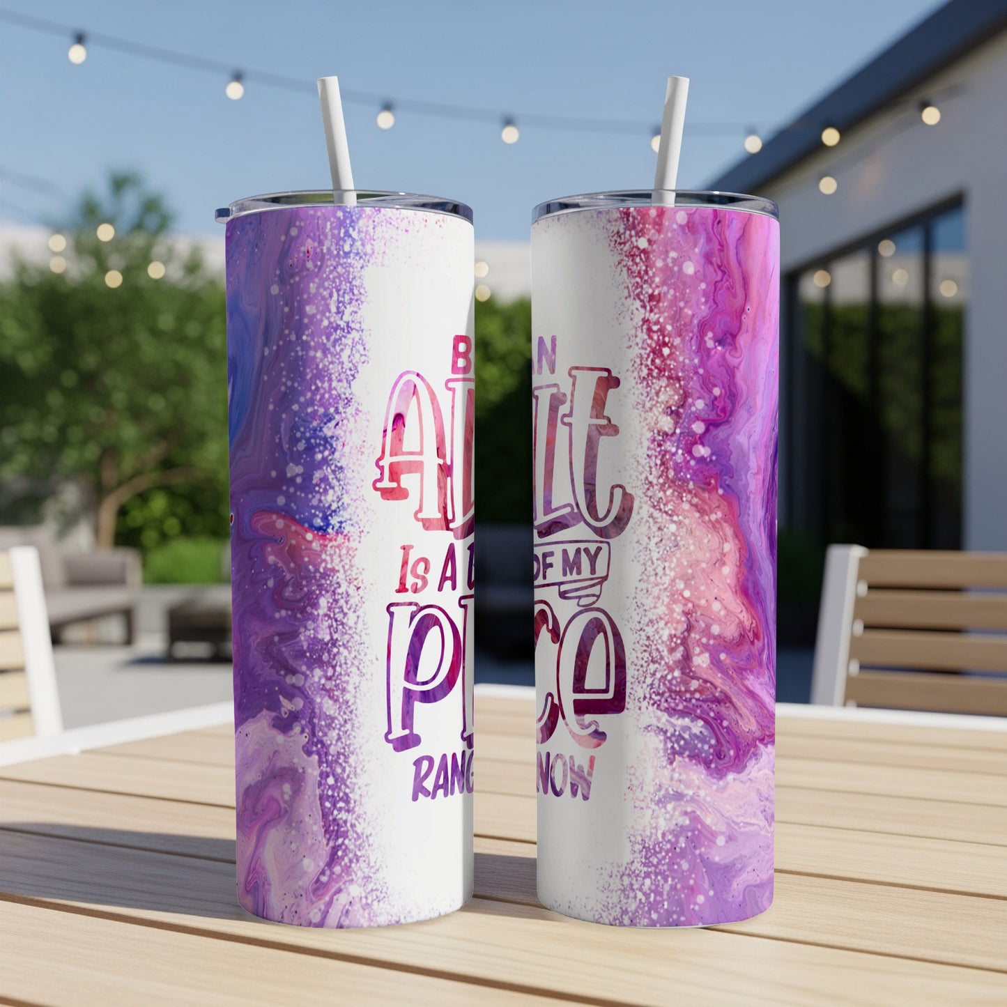 Two tumblers with marbled purple and pink designs and text.