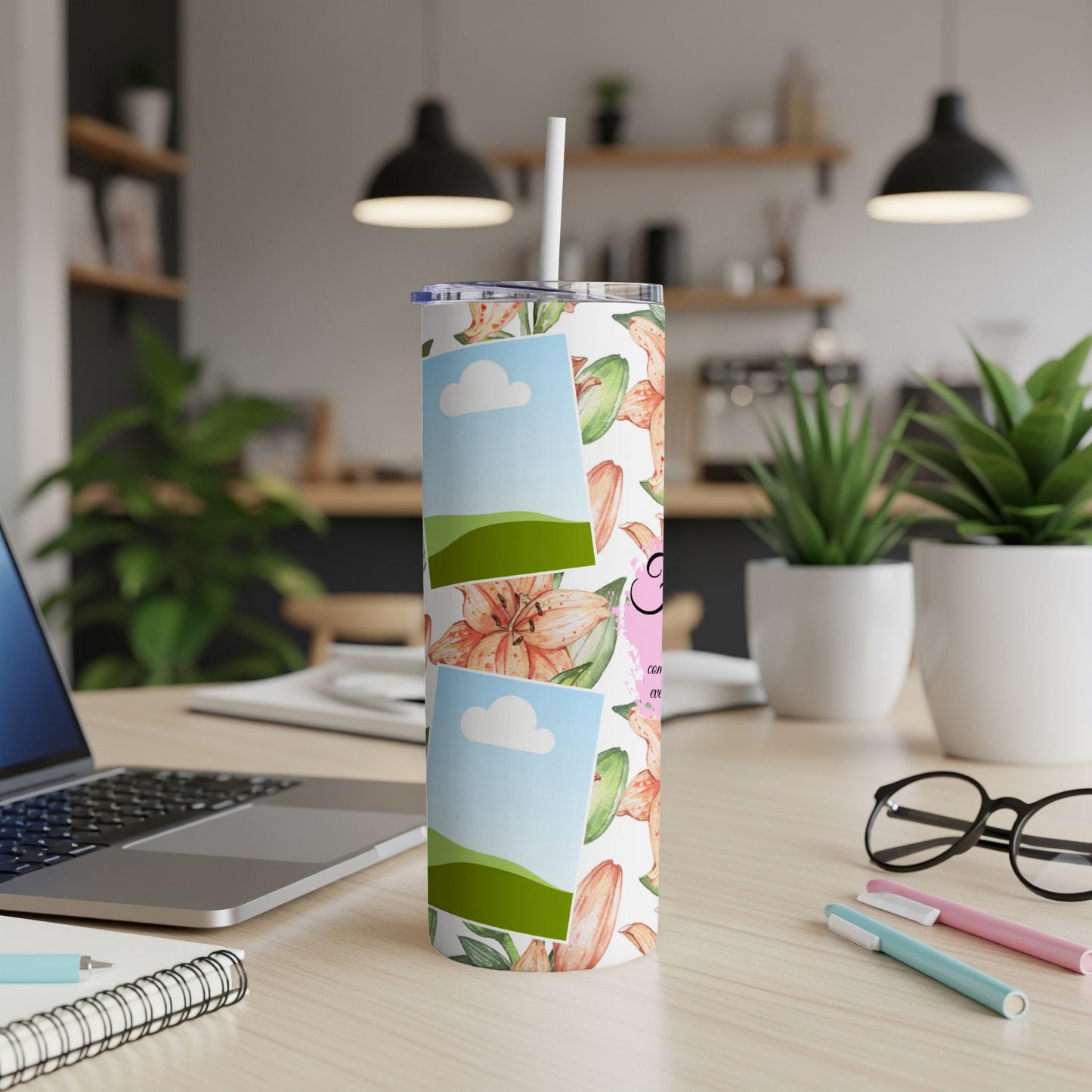 White tumbler with floral pattern and photo placeholders, sitting on a desk.