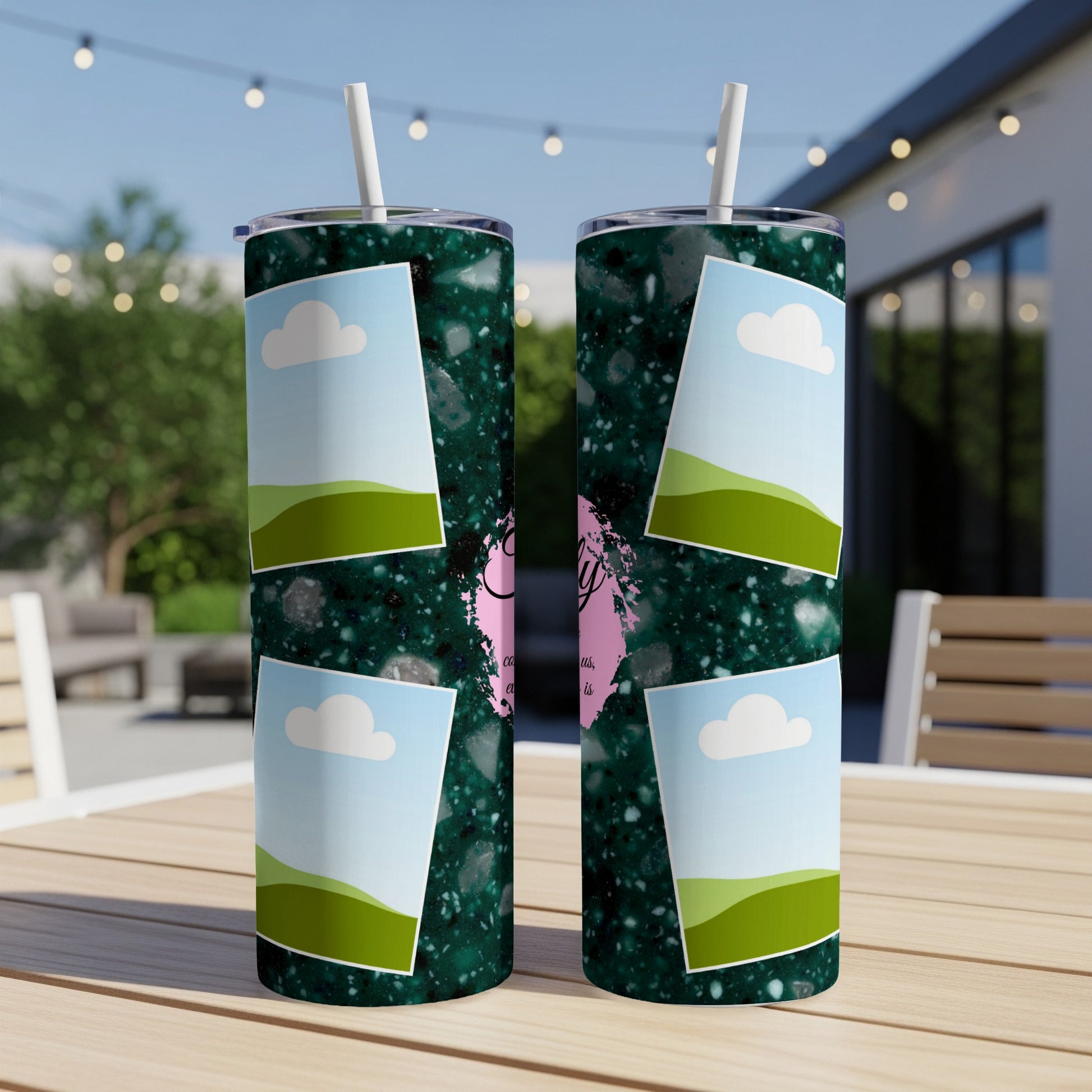 Two tumblers with a dark green speckled pattern and photo placeholders featuring clouds and hills.