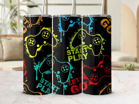 Three tumblers with a colorful video game controller design and text.
