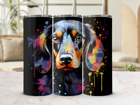 Black tumbler with a colorful dachshund portrait and paint splatter design.