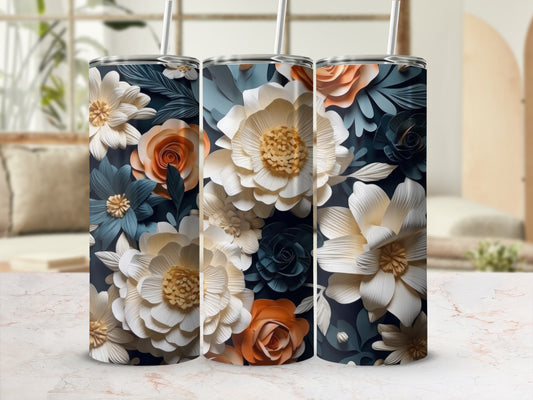 Three tumblers with floral patterns in white, orange, and navy blue.