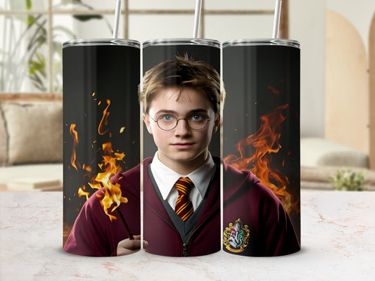 Harry Potter with wand and flames, Hogwarts crest on hoodie.