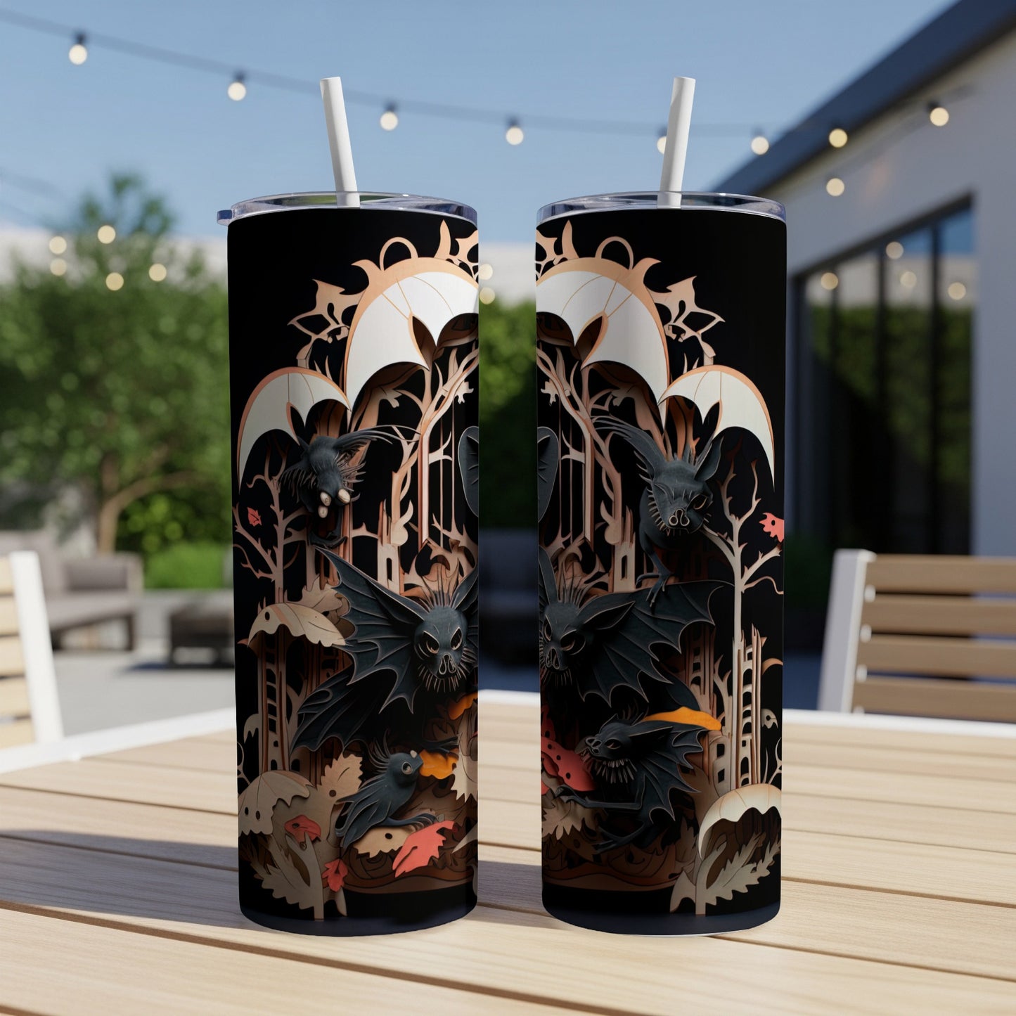 Two tumblers with a gothic bat and skeletal design.