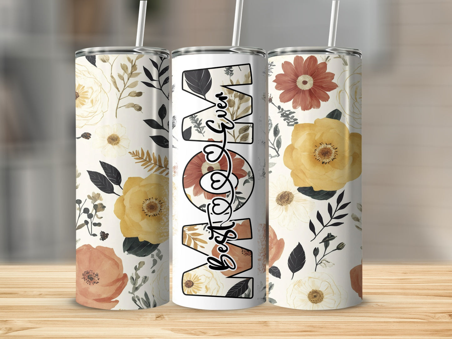 Floral tumbler with "Best Mom" text and floral designs.
