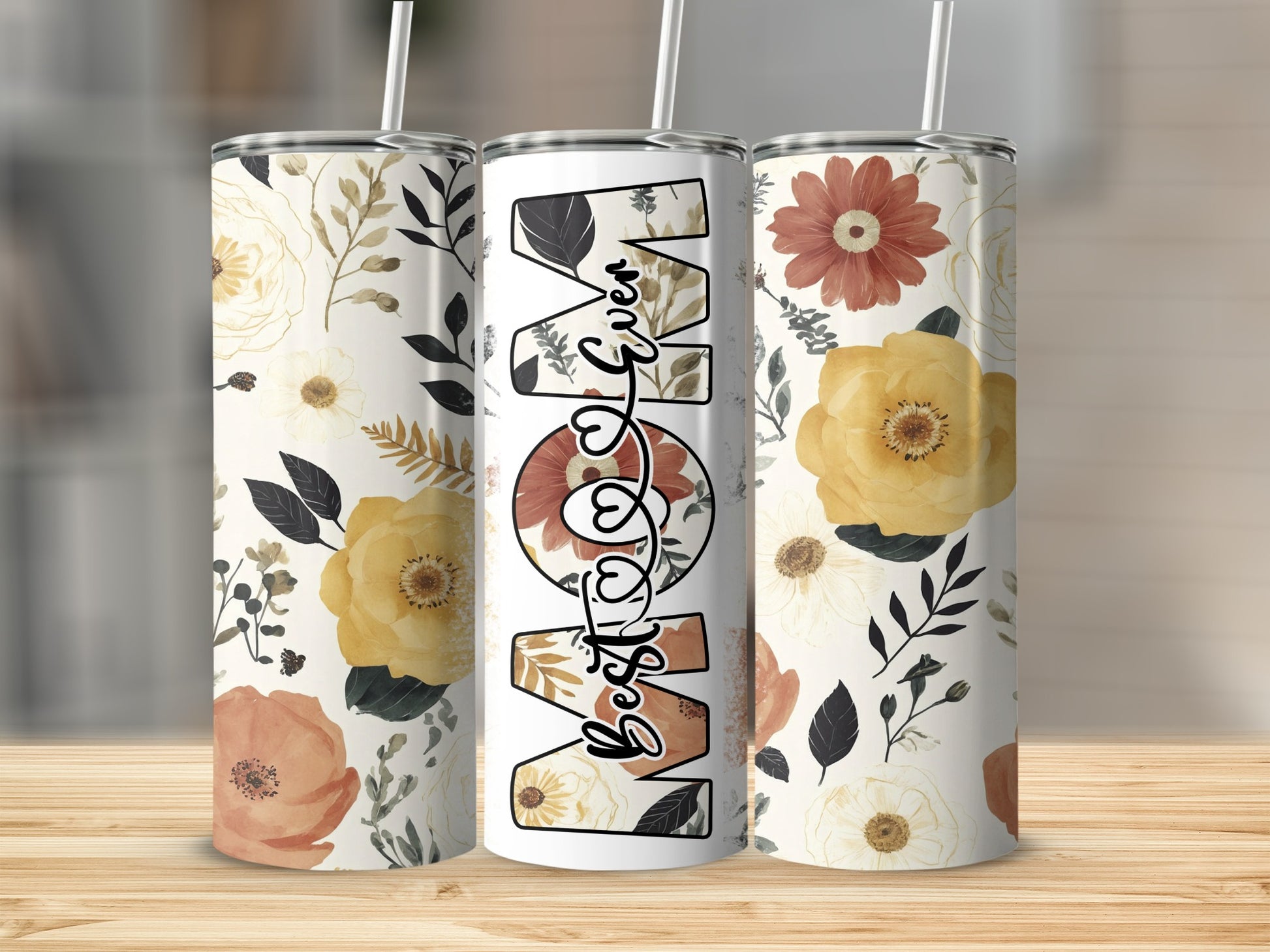Floral tumbler with "Best Mom" text and floral designs.