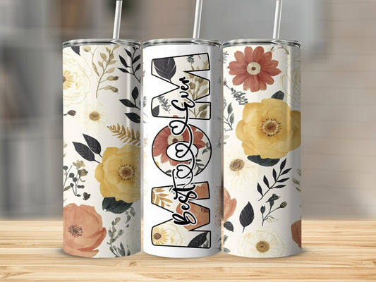 Floral tumbler with "Best Mom" text and floral designs.