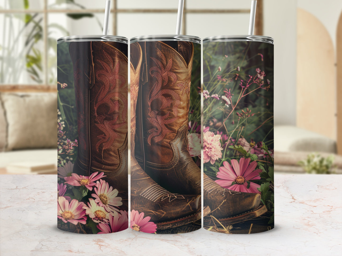 Brown cowboy boots with pink stitching nestled in flowers.