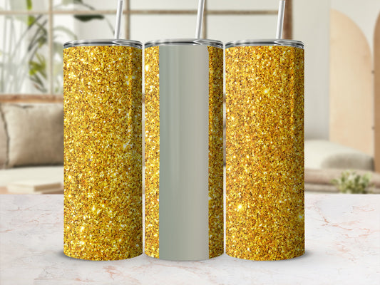 Three glitter tumblers with straws on a marble surface.