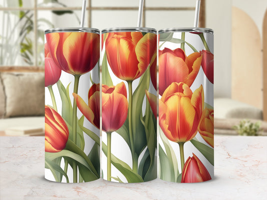 Three tumblers with a vibrant red and yellow tulip floral pattern.