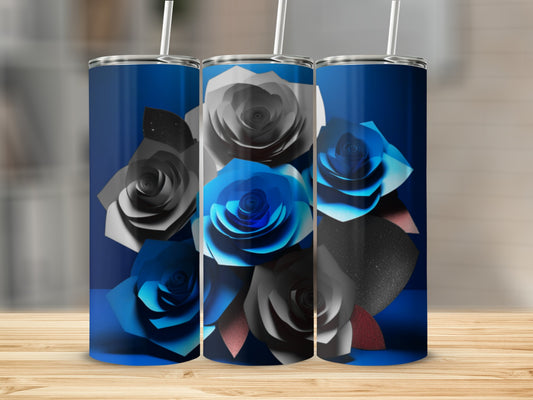 Three blue and gray paper roses arranged on a dark blue background.
