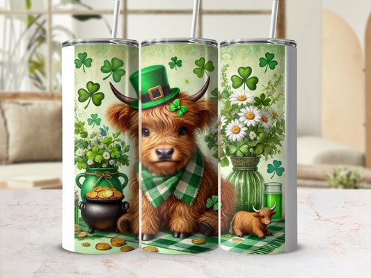 Highland cow wearing a green hat and scarf, surrounded by shamrocks and coins.