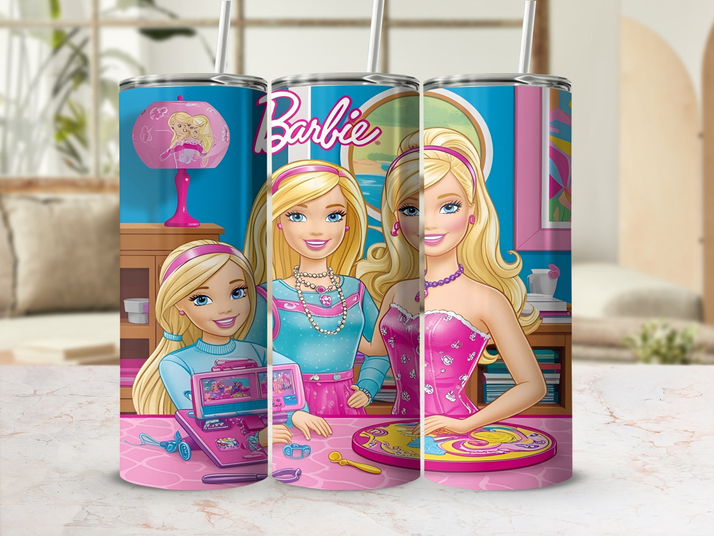 Barbie dolls and accessories on a pink desk, with Barbie logo.