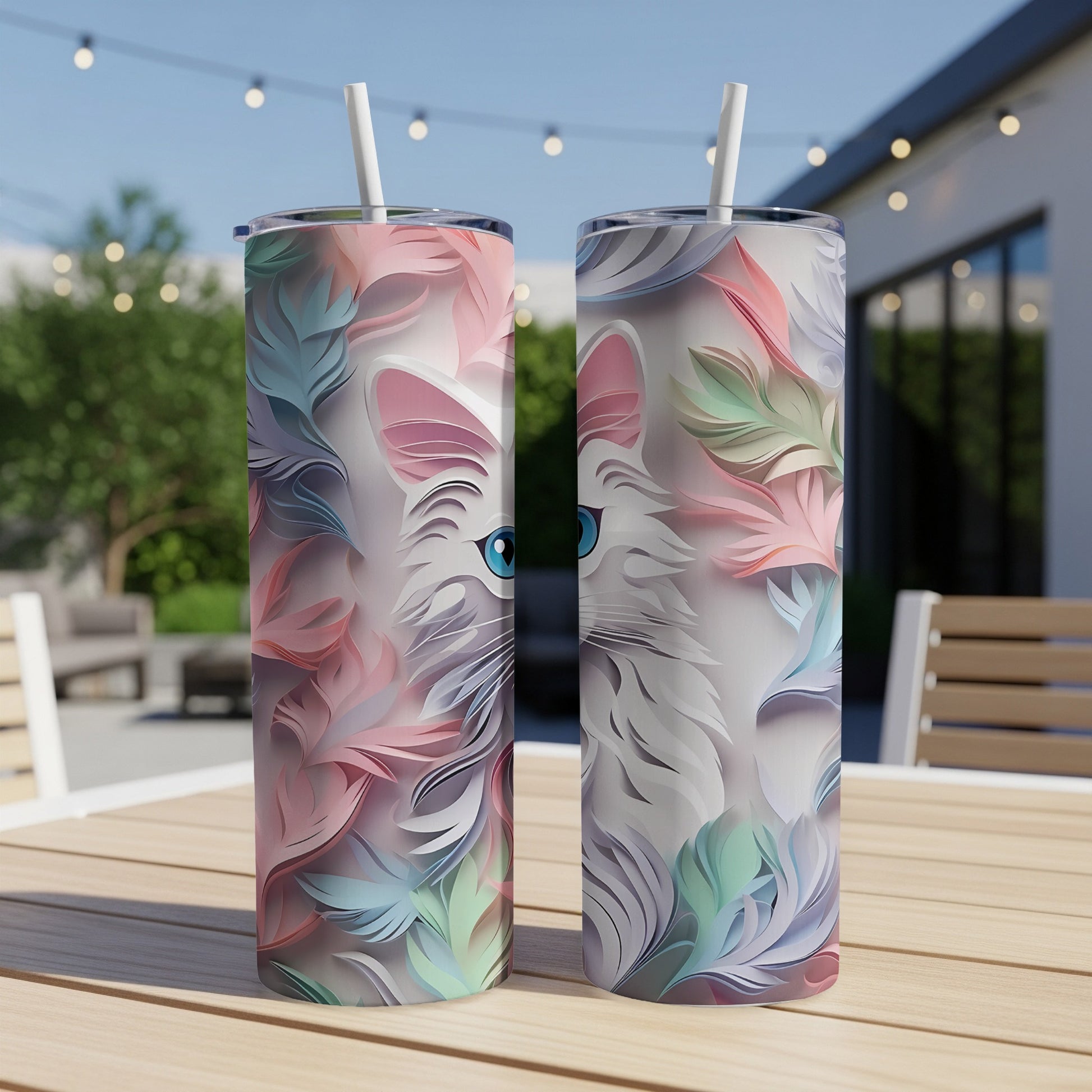 White cat with pastel feathers design on two slim tumblers.
