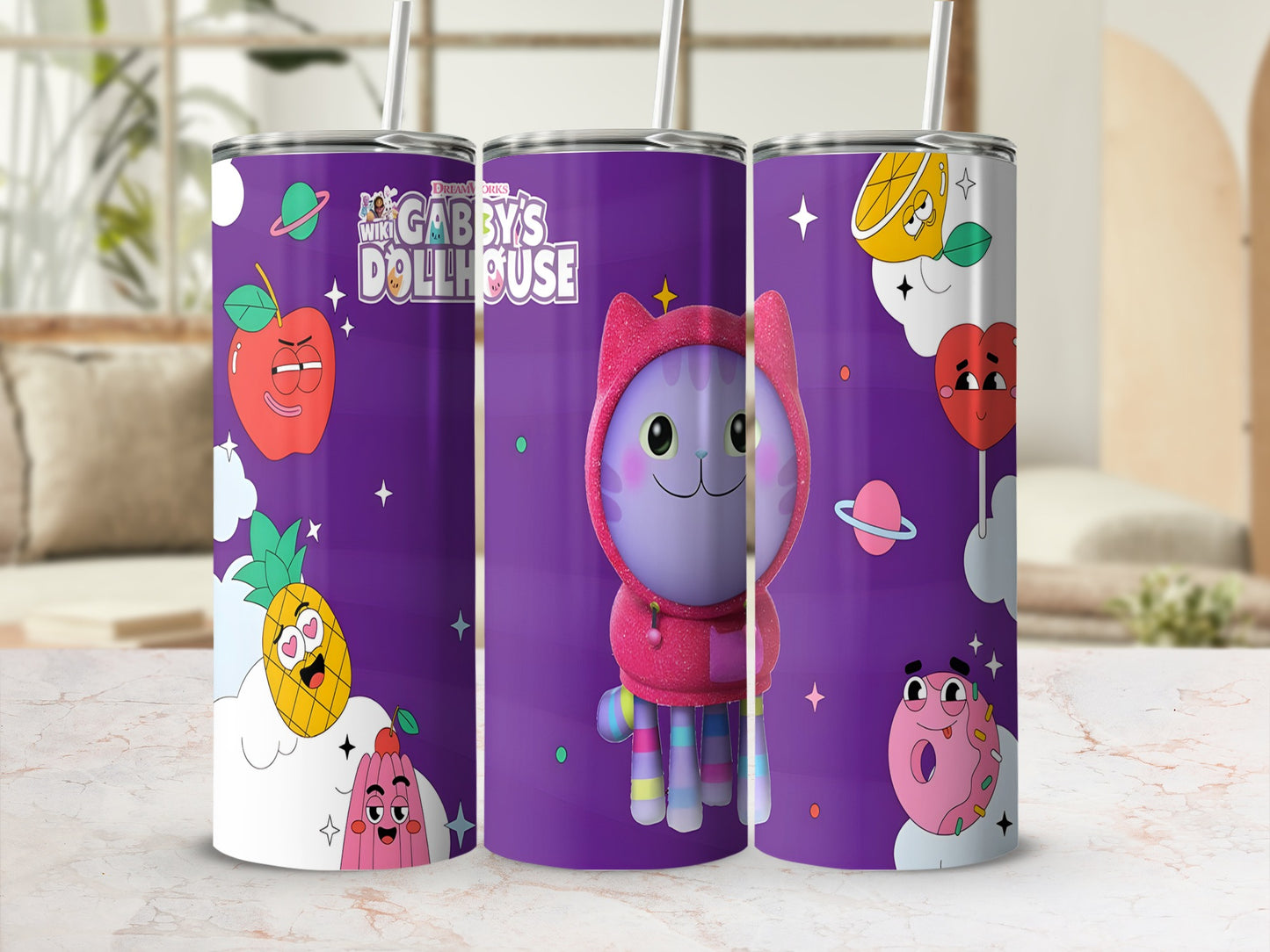 Gabby's Dollhouse character on purple tumbler with fruit and planet designs.