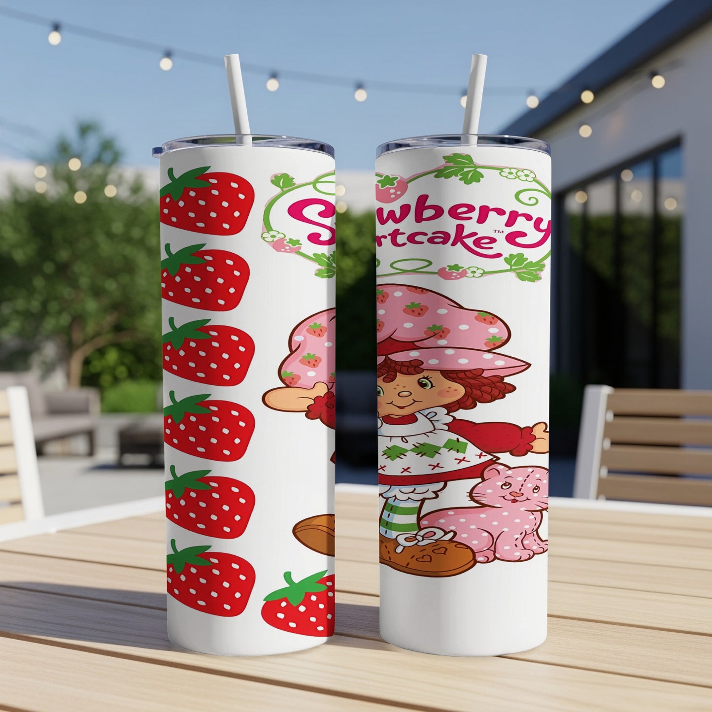 Strawberry Shortcake with cat and strawberries on a white tumbler.